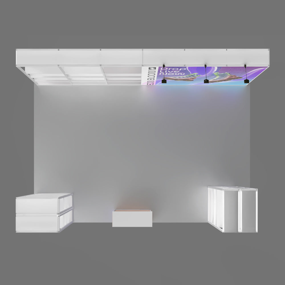 Front perspective view of a 20ft modular rack trade show booth layout, featuring an overhead structural canopy with custom graphics, spotlights, independent shelf towers, and a center counter.