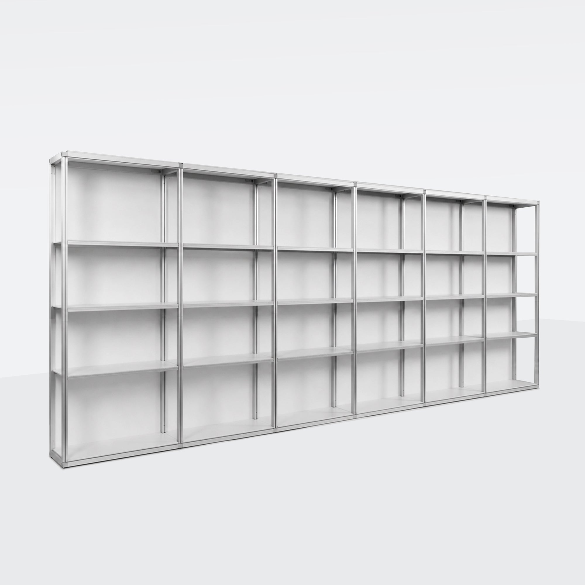 Long perspective view of the unassembled heavy-duty silver aluminum frame and 5-tier metal shelving structure for a 20ft modular rack display
