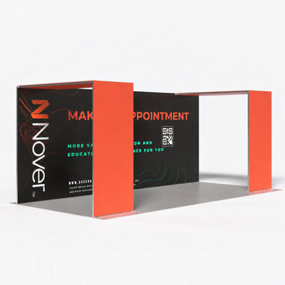 20ft QSEG 40 trade show booth display featuring dual overhead bridges, backwall graphics, and custom presentation counter.