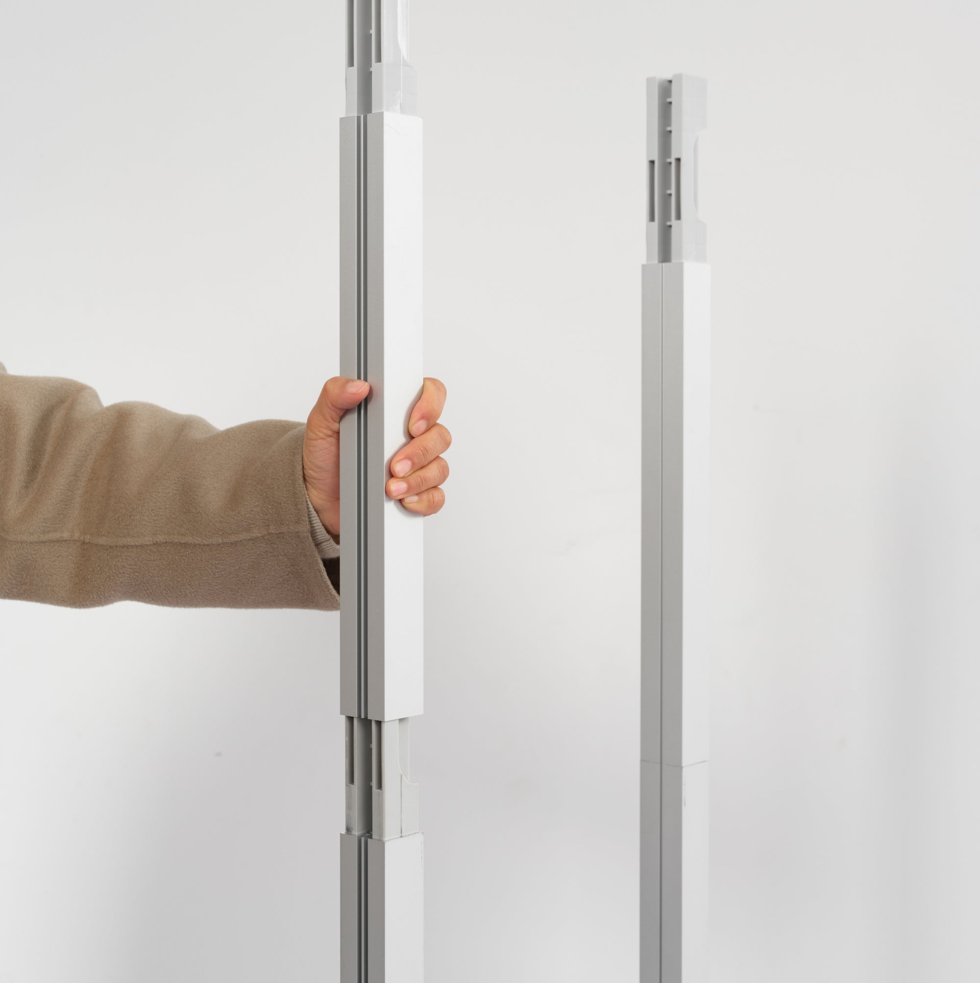 Installing the extension pole onto a Modular Rack frame for 240cm height