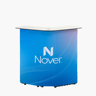 Portable 2-in-1 hard case shell counter with custom branded fabric wrap for trade show reception
