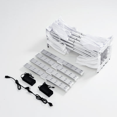 Internal components of 10ft Fabric Popup Light Box: Folded aluminum scissor frame, edge-lit LED bars, and power adapters
