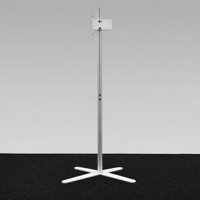 Slim 8mm steel feet of TV Stand X for discreet placement under display walls